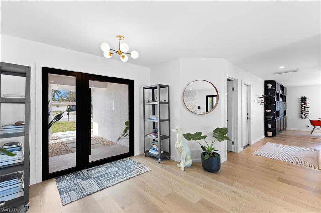 70 Thorncrest Lane Naples, FL 34113 - Photo 4 of 50 a view of living room filled with furniture