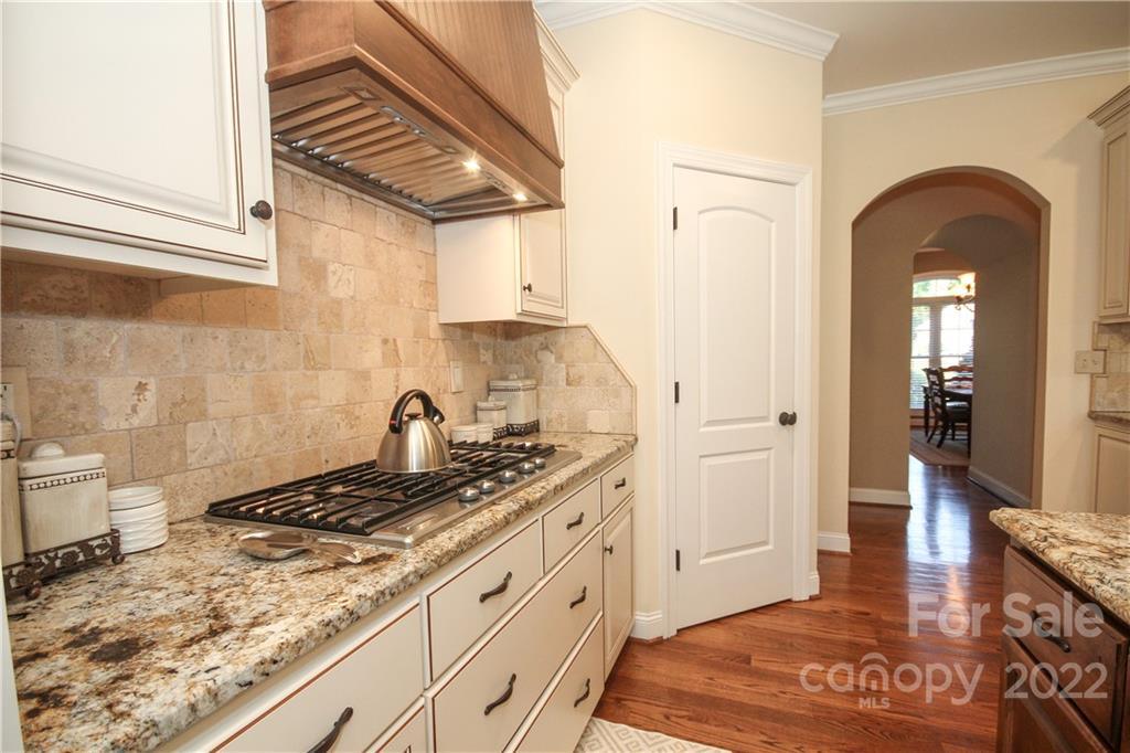 159 Abbington Place, Unit 16 Locust, NC 28097 - Photo 17 of 47 a kitchen with sink cabinets and stove