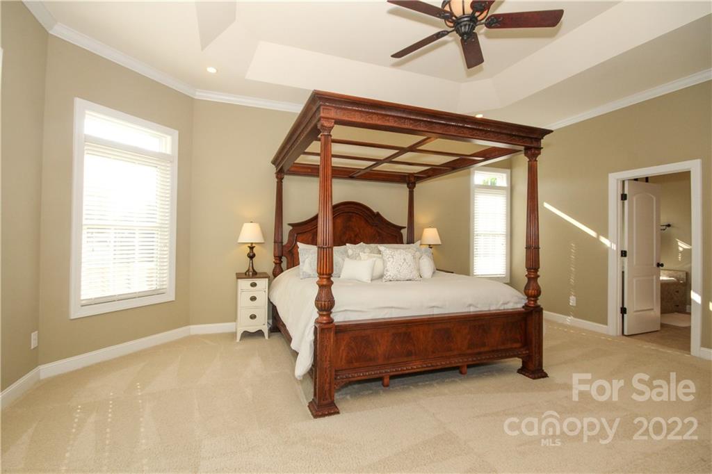 159 Abbington Place, Unit 16 Locust, NC 28097 - Photo 19 of 47 a bedroom with a bed and window