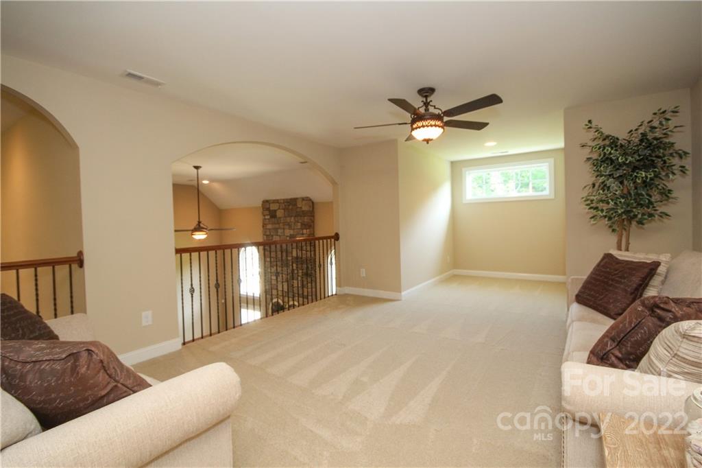 159 Abbington Place, Unit 16 Locust, NC 28097 - Photo 29 of 47 a living room with furniture