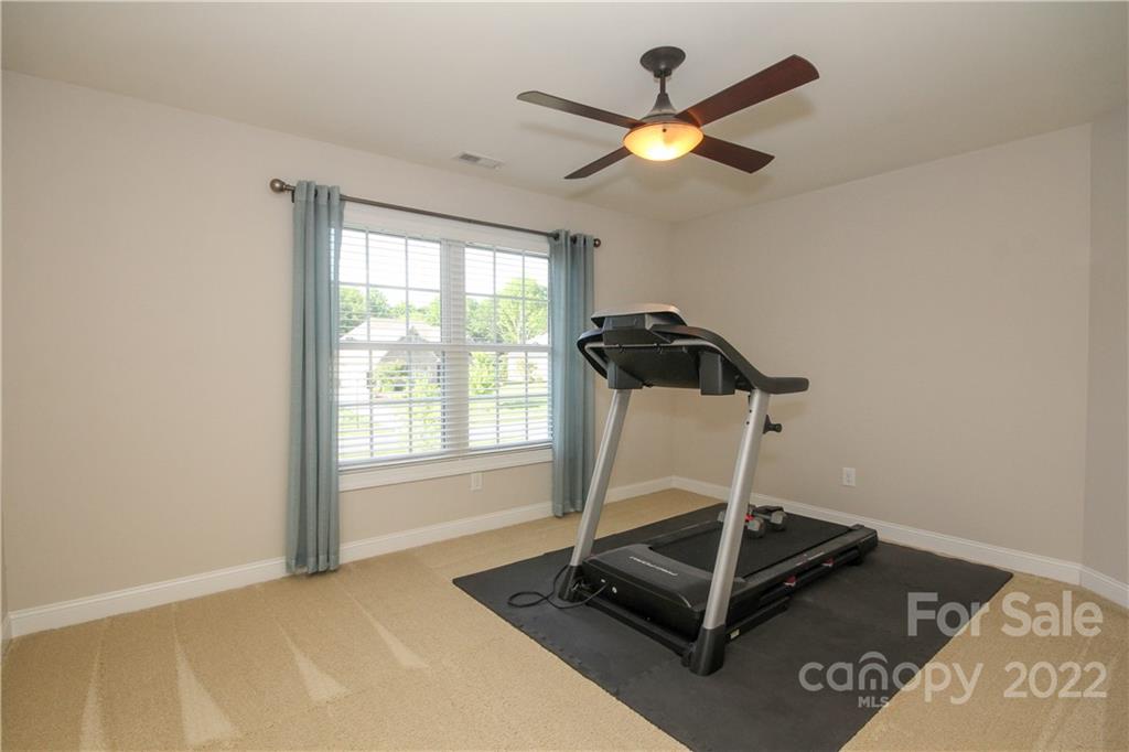159 Abbington Place, Unit 16 Locust, NC 28097 - Photo 30 of 47 a view of a room with gym equipment