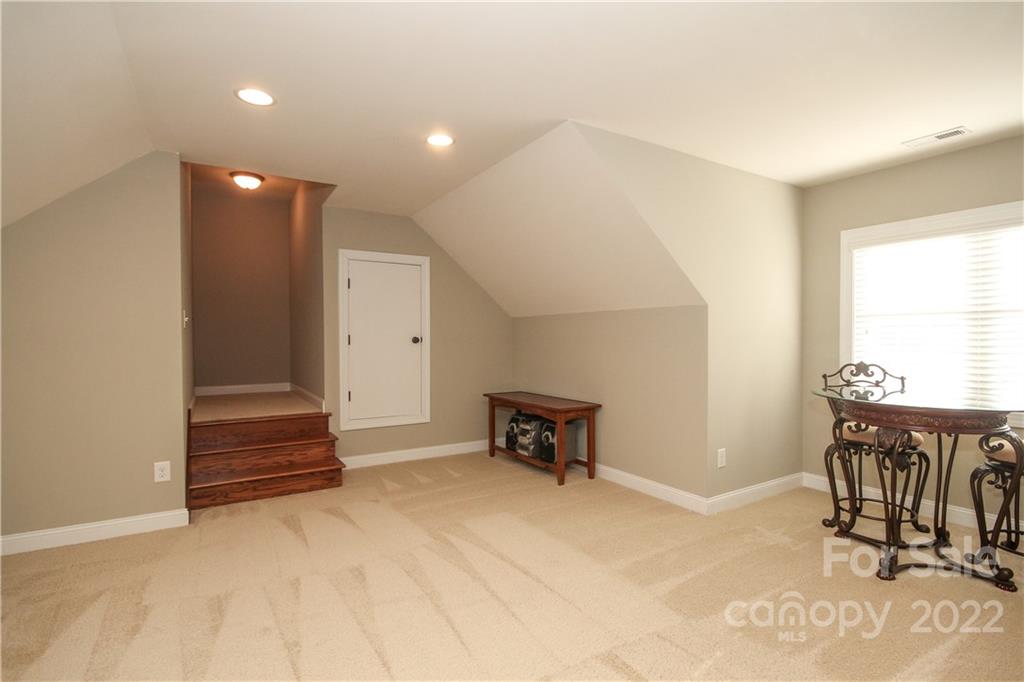 159 Abbington Place, Unit 16 Locust, NC 28097 - Photo 32 of 47 a view of an empty room with a window