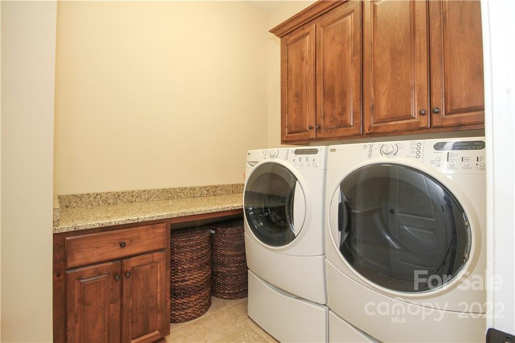 159 Abbington Place, Unit 16 Locust, NC 28097 - Photo 35 of 47 a utility room with dryer and washer
