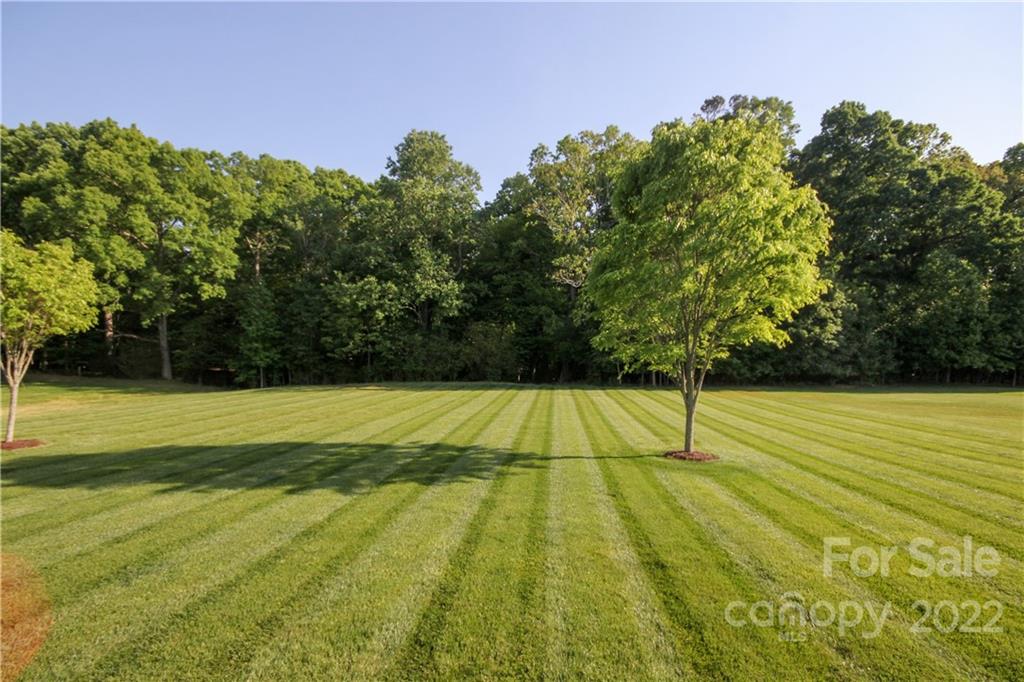 159 Abbington Place, Unit 16 Locust, NC 28097 - Photo 38 of 47 a view of an outdoor space and a yard