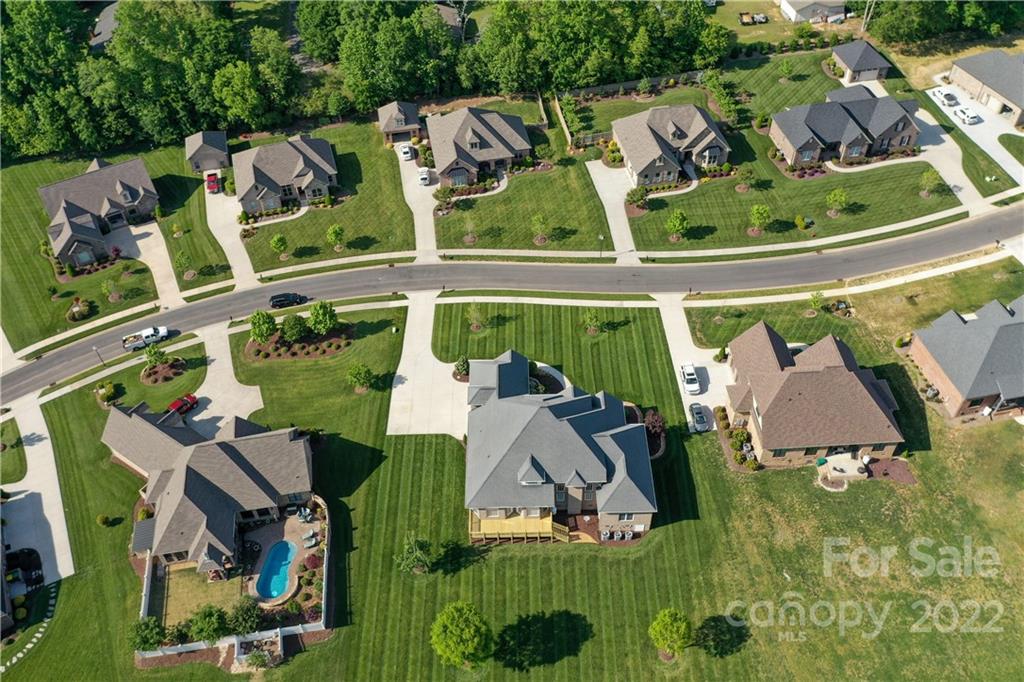 159 Abbington Place, Unit 16 Locust, NC 28097 - Photo 44 of 47 an aerial view of residential houses with outdoor space