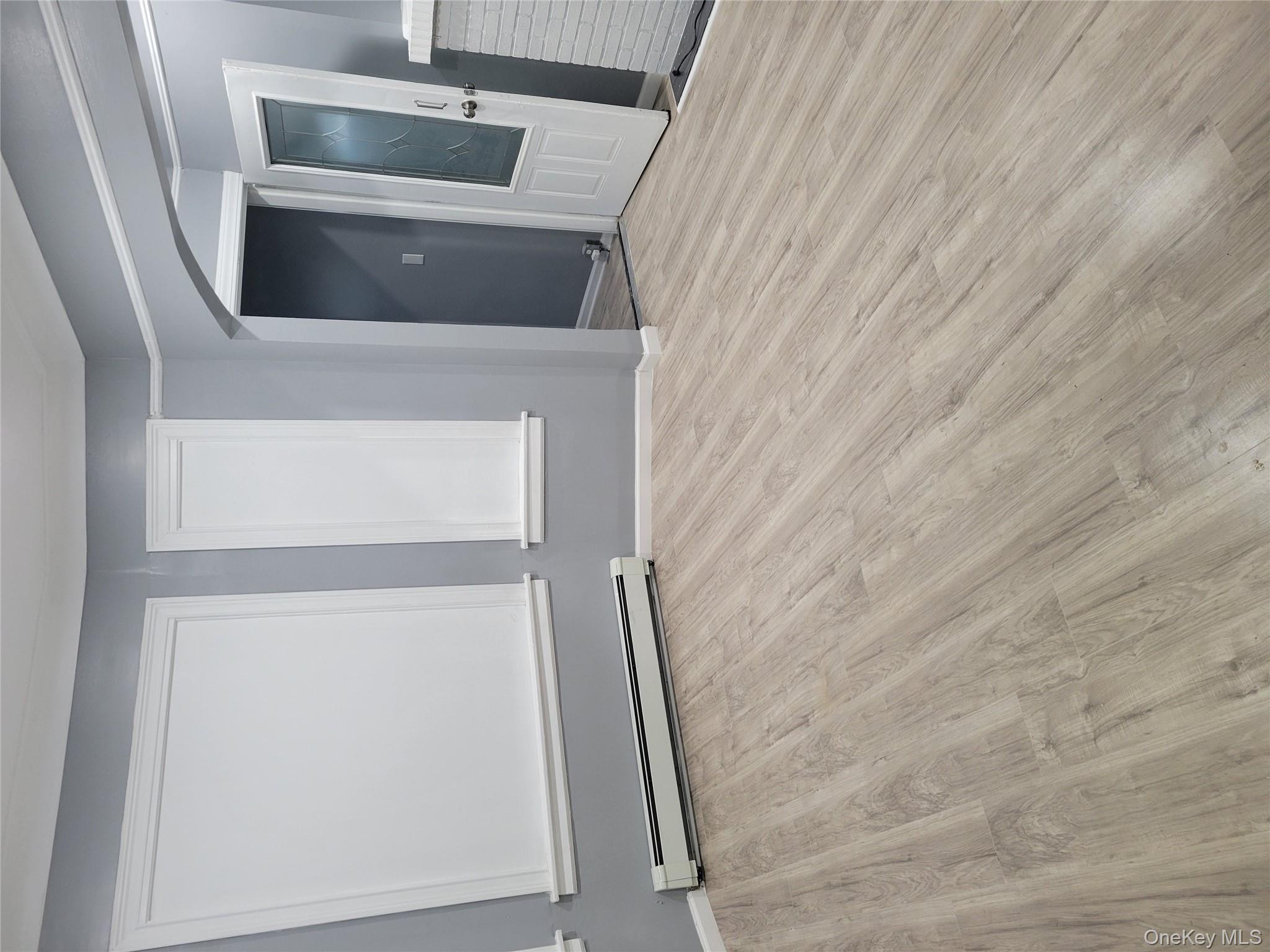 871 Throgs Neck Expressway, Unit 1 Bronx, NY 10465 - Photo 5 of 19 Living Room plus New Flooring