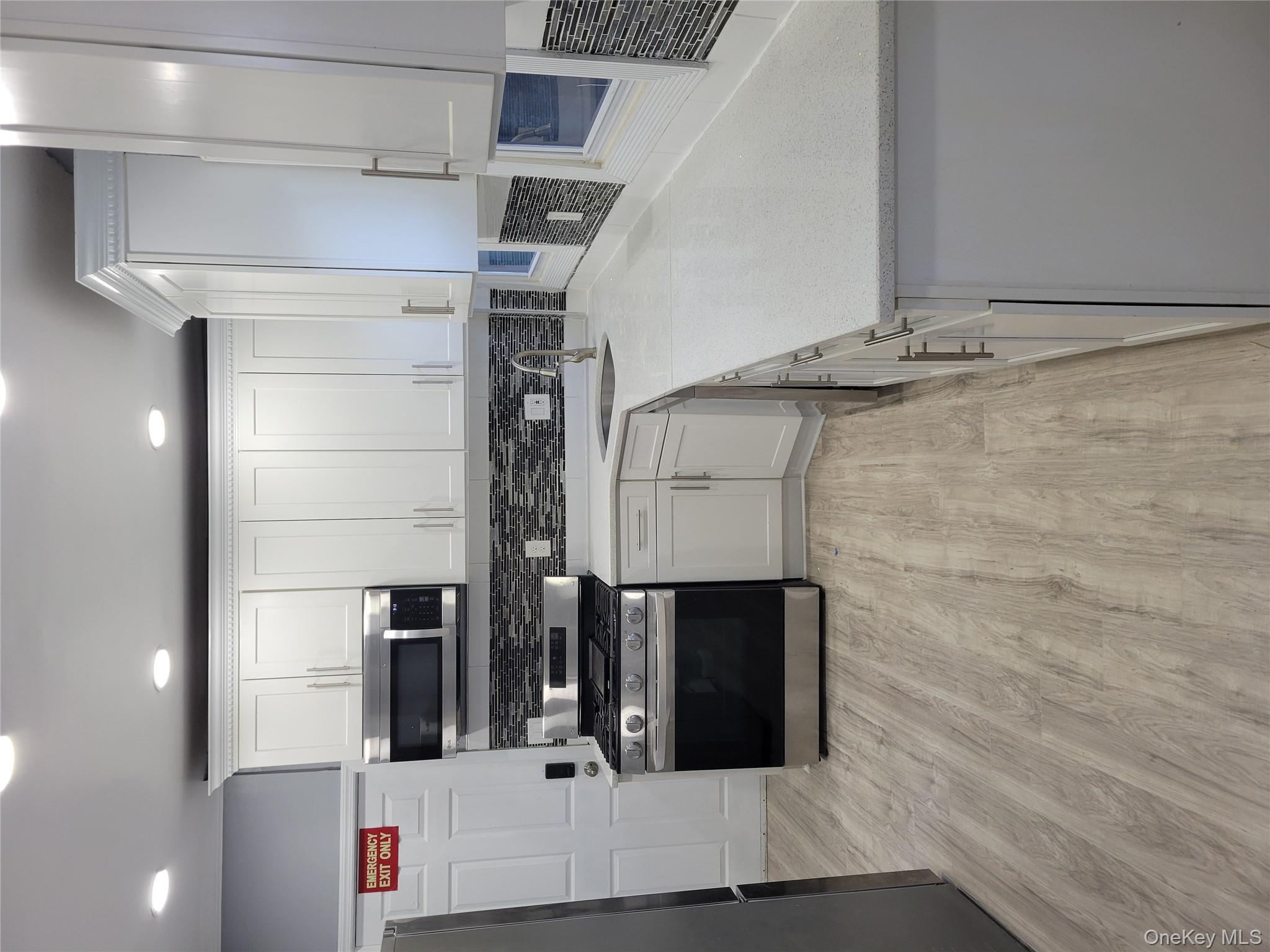 871 Throgs Neck Expressway, Unit 1 Bronx, NY 10465 - Photo 9 of 19 Kitchen with Stainless Steele Appliances