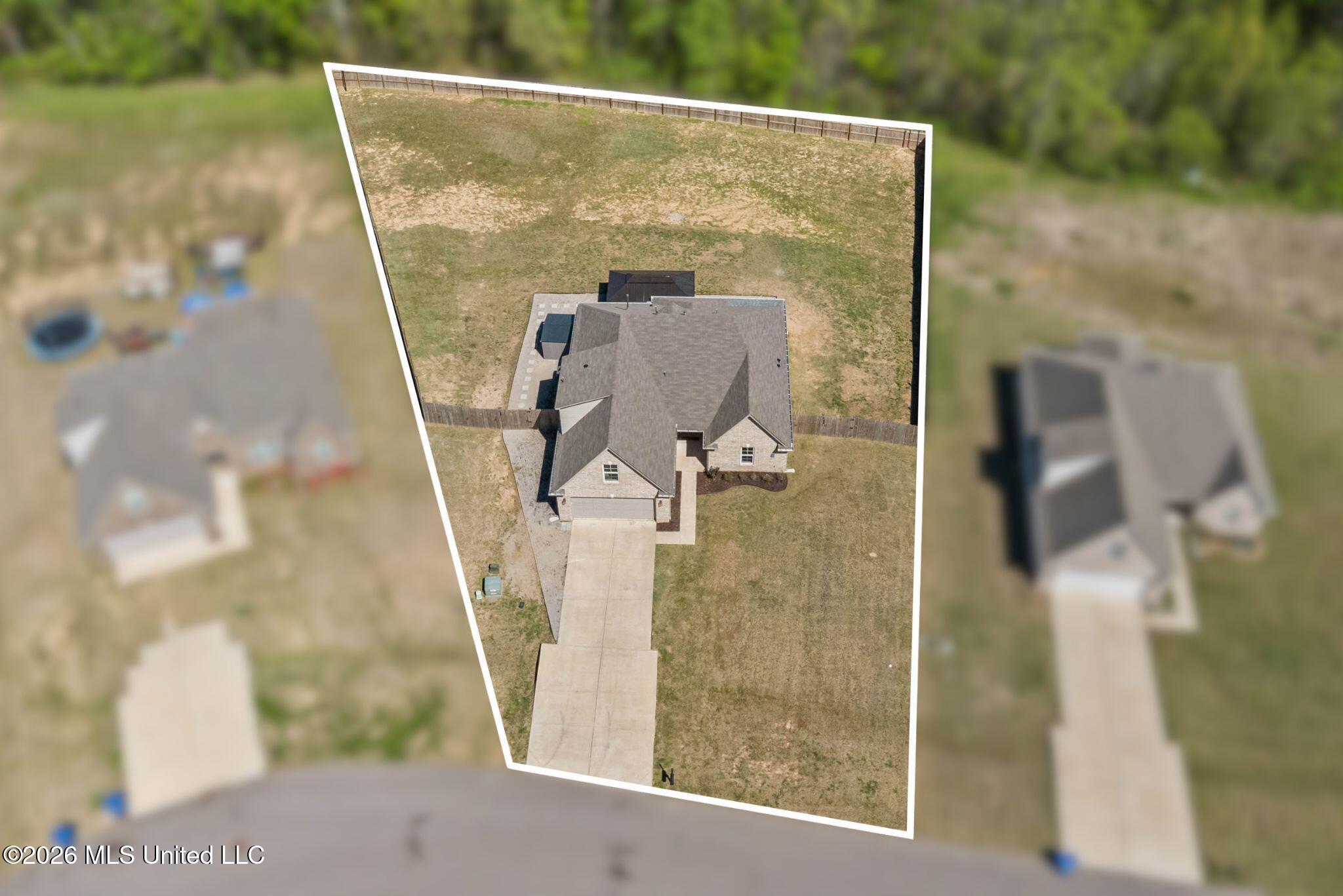 7616 Ridgefield Drive Horn Lake, MS 38637 - Photo 2 of 26 29-Drone with Lot Lines Fuzzy