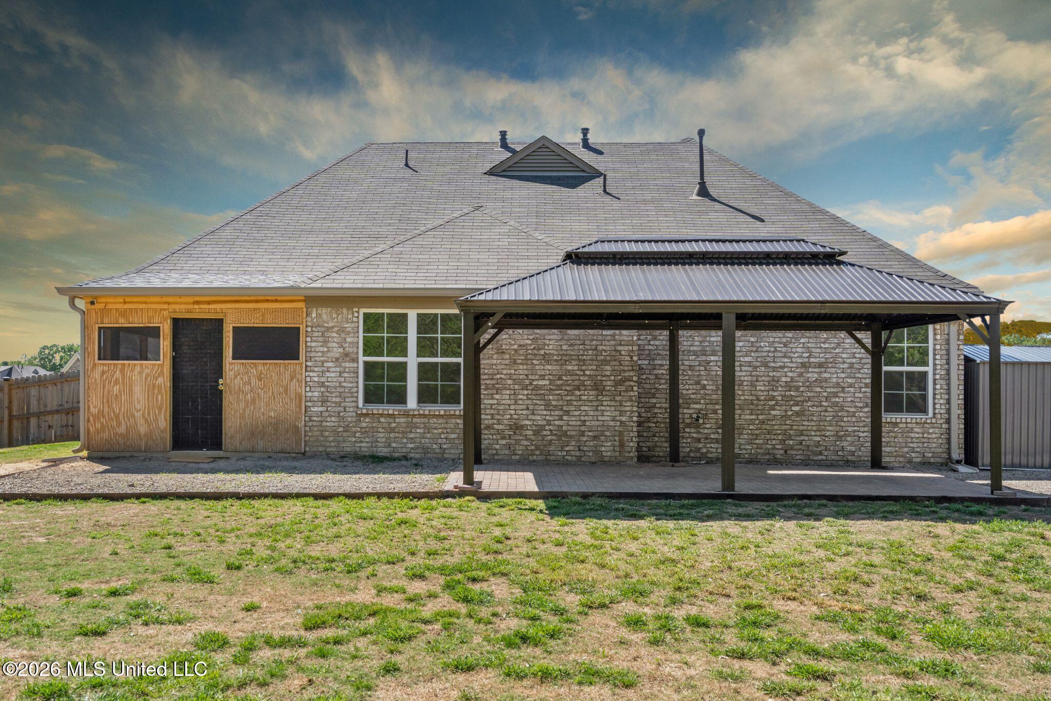 7616 Ridgefield Drive Horn Lake, MS 38637 - Photo 21 of 26 26-Back Exterior dramatic sky