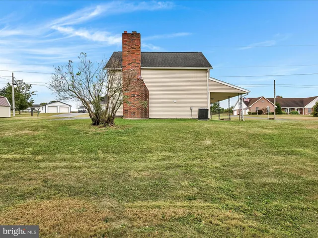 a view of a porch with a yard