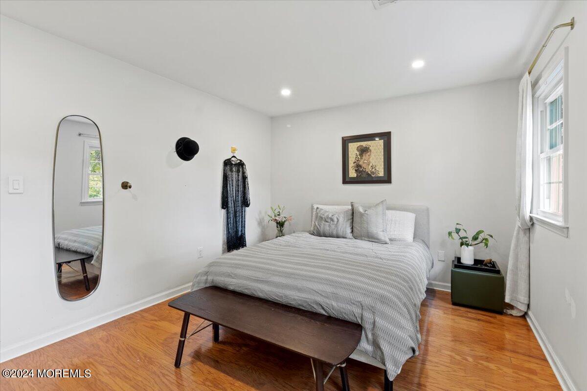 3 Moak Drive Hazlet, NJ 07730 - Photo 12 of 27 a bedroom with a bed and a dresser