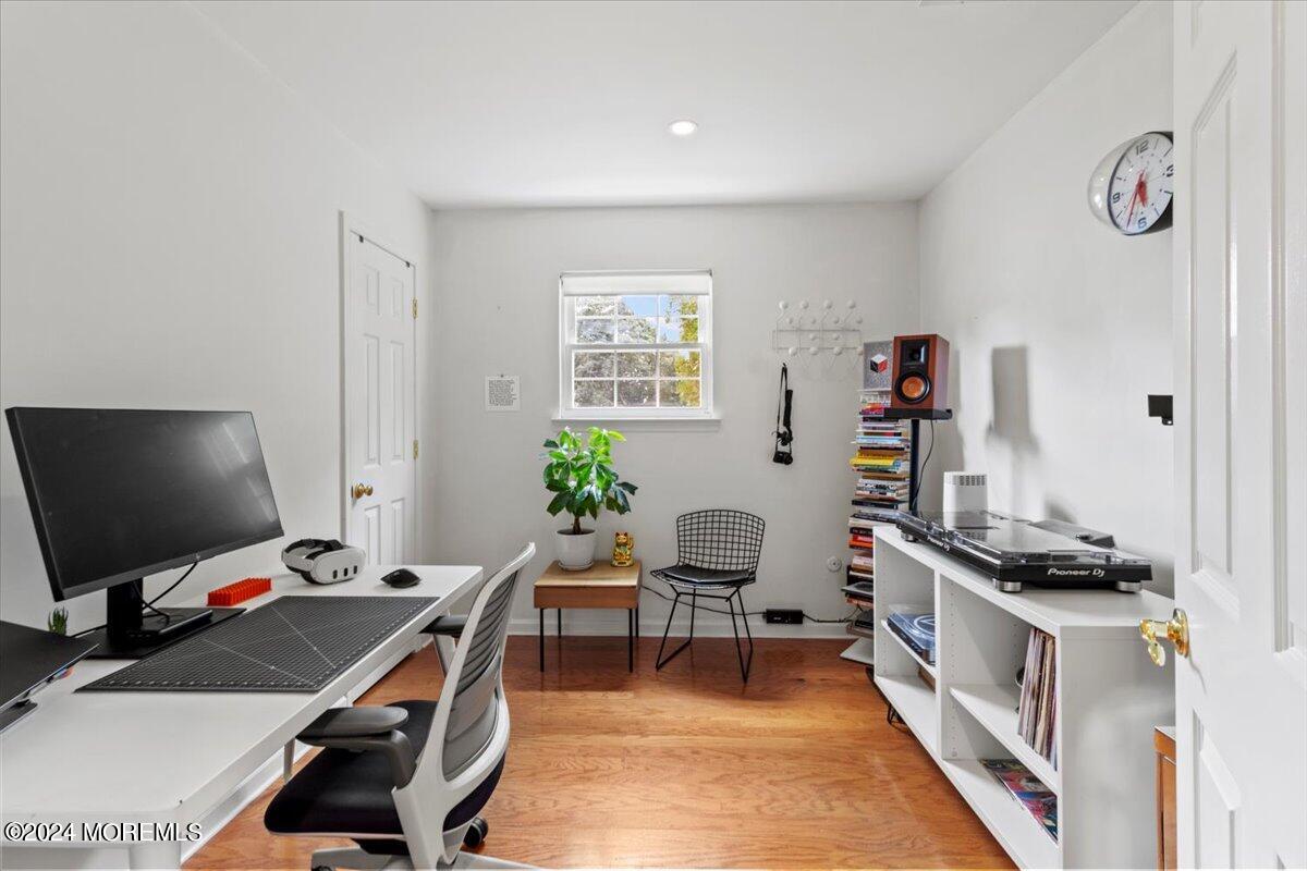 3 Moak Drive Hazlet, NJ 07730 - Photo 18 of 27 a workspace with furniture and wooden floor