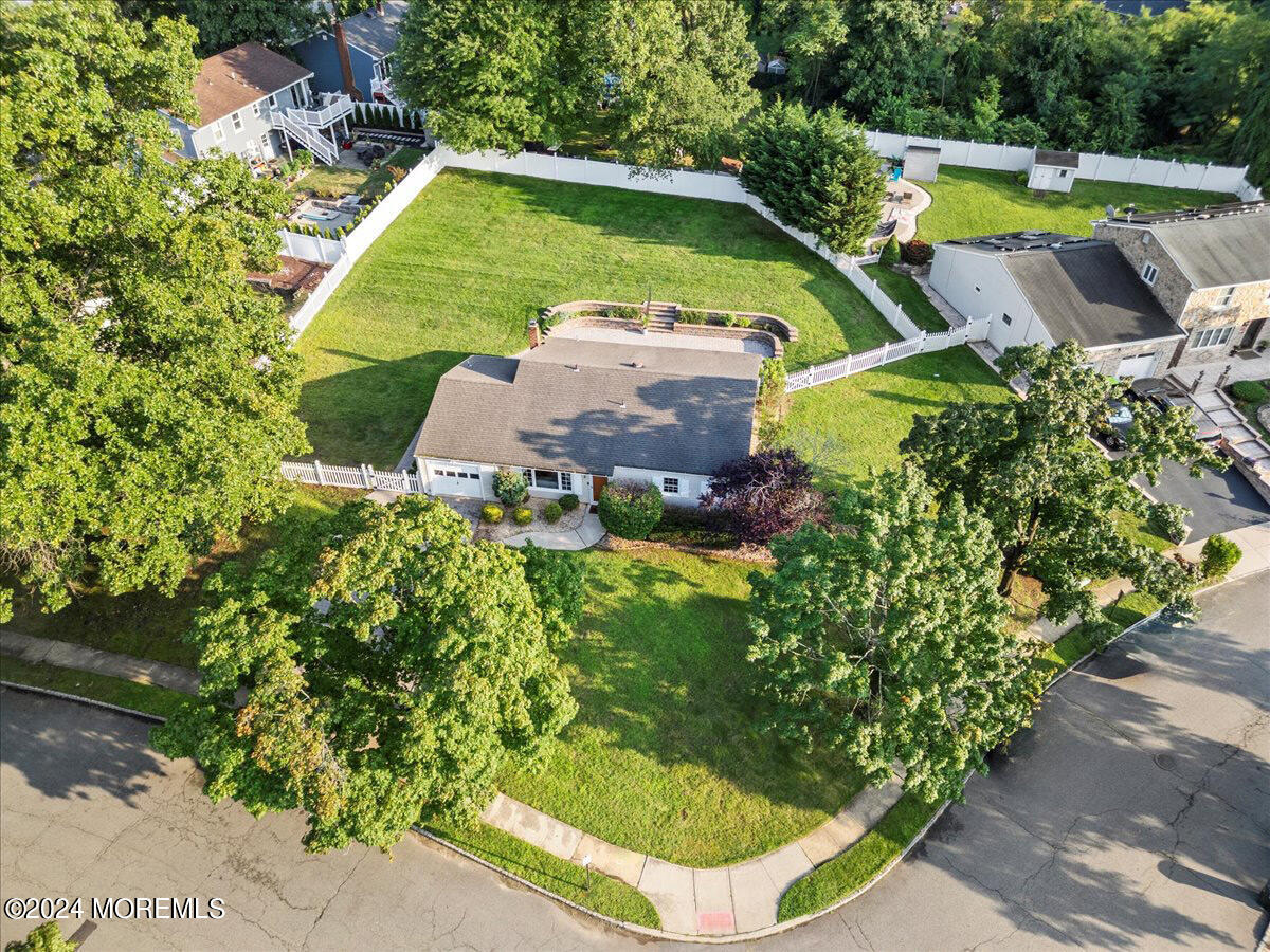 3 Moak Drive Hazlet, NJ 07730 - Photo 2 of 27 a view of a swimming pool with sitting area