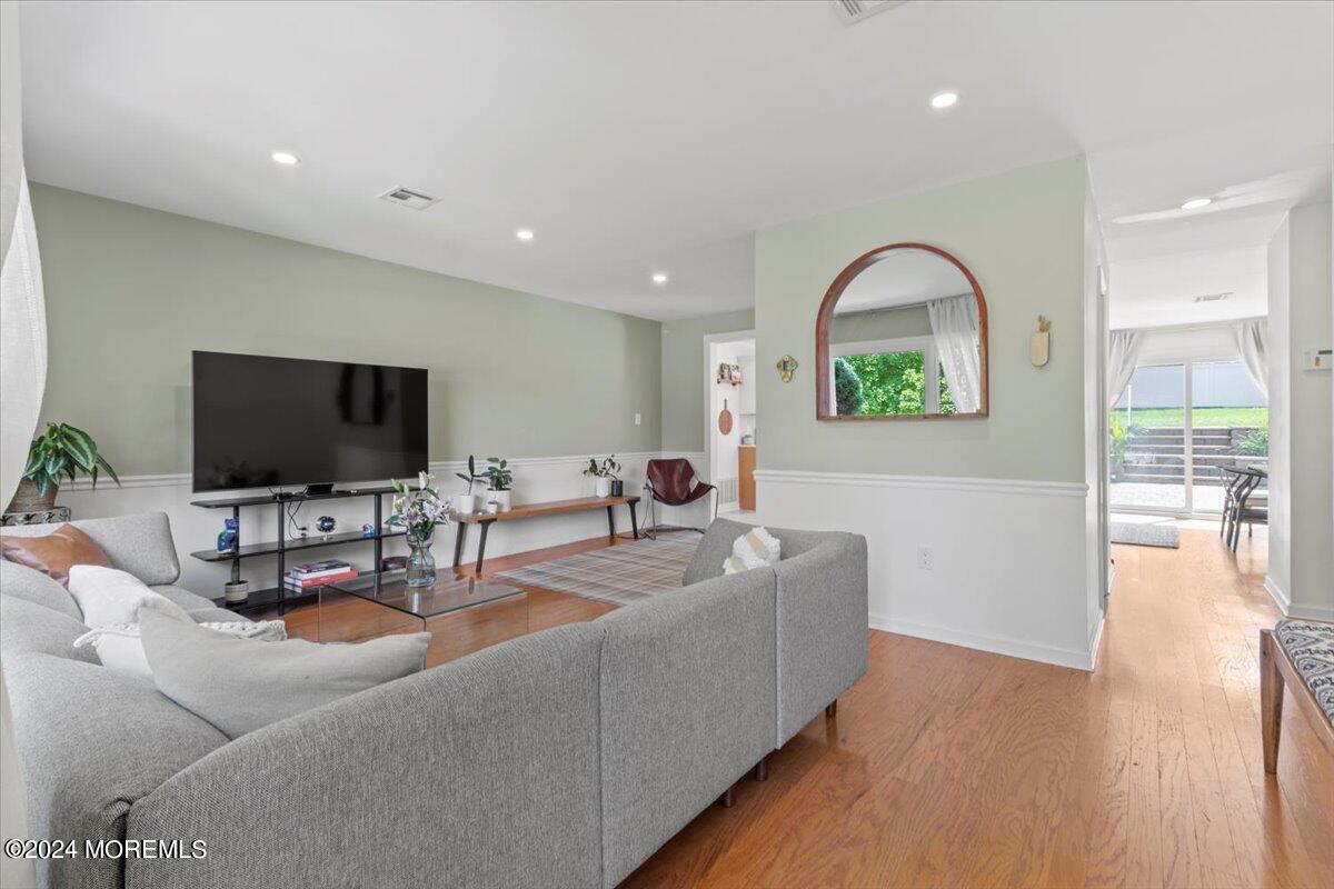 3 Moak Drive Hazlet, NJ 07730 - Photo 4 of 27 a living room with furniture and a flat screen tv