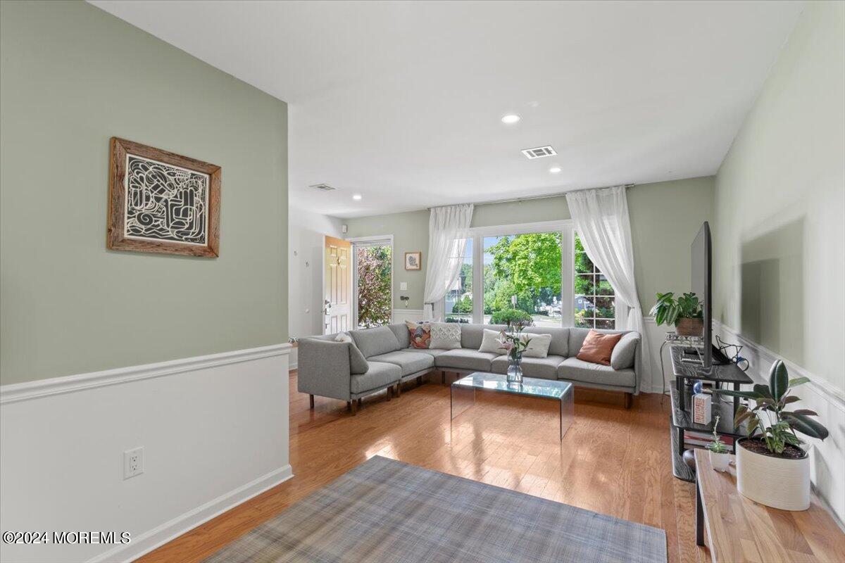 3 Moak Drive Hazlet, NJ 07730 - Photo 6 of 27 a living room with furniture and a large window