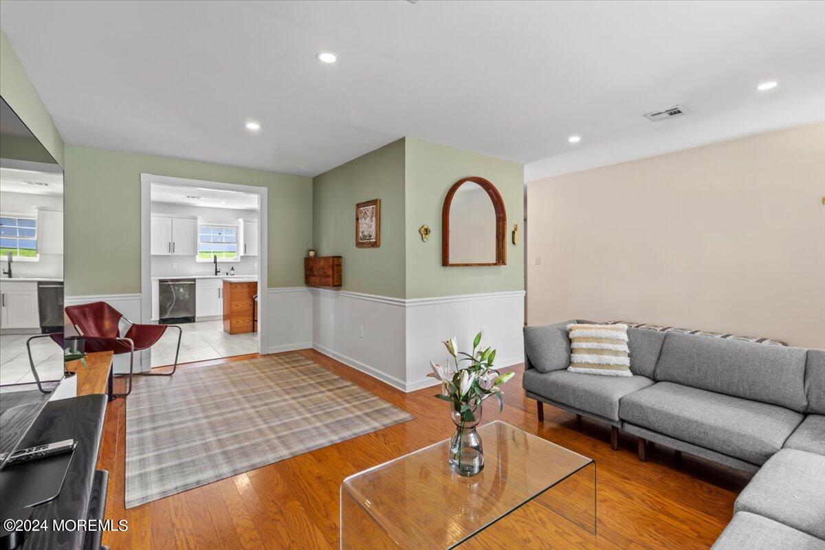 3 Moak Drive Hazlet, NJ 07730 - Photo 7 of 27 a living room with furniture and wooden floor