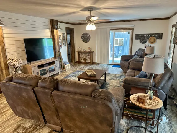 a kitchen with granite countertop a stove and a refrigerator