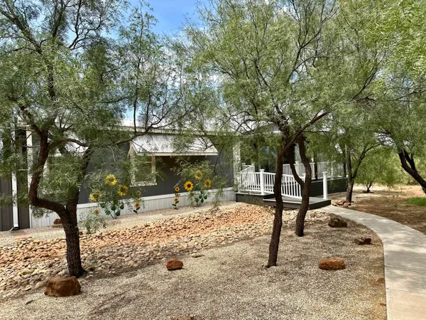 a bedroom with bed and window