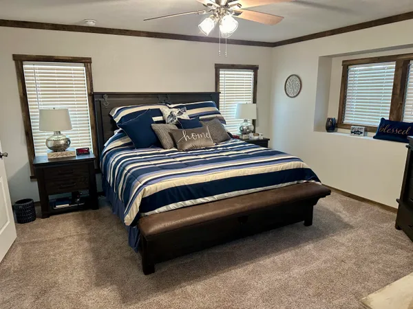 a kitchen with stainless steel appliances granite countertop a stove and a refrigerator