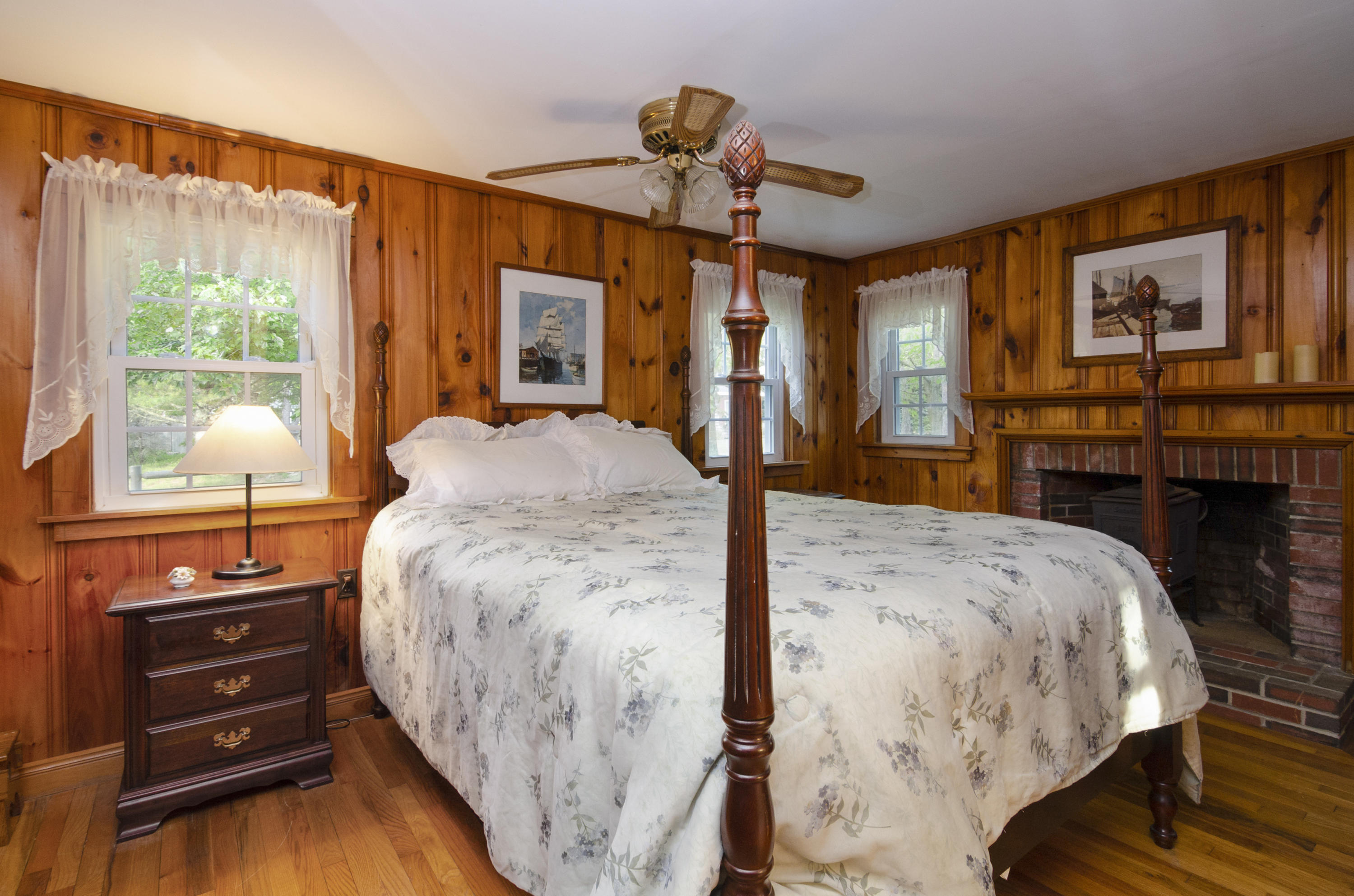 23 Skippers Way Brewster, MA 02631 - Photo 11 of 27 a bed sitting in a bedroom next to a window