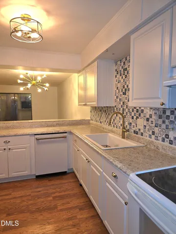 a bathroom with a sink a vanity and a mirror
