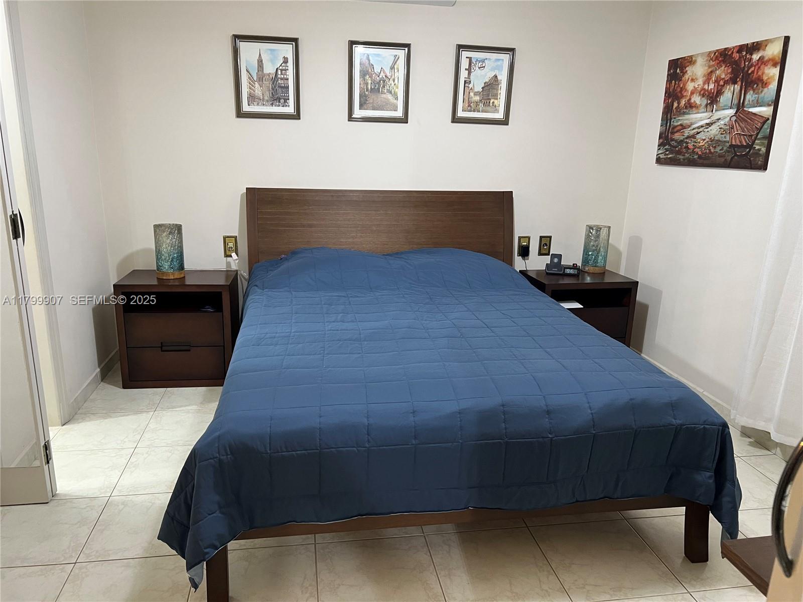 undefined, SP 13930 - Photo 20 of 26 a bedroom with bed and paintings on the wall