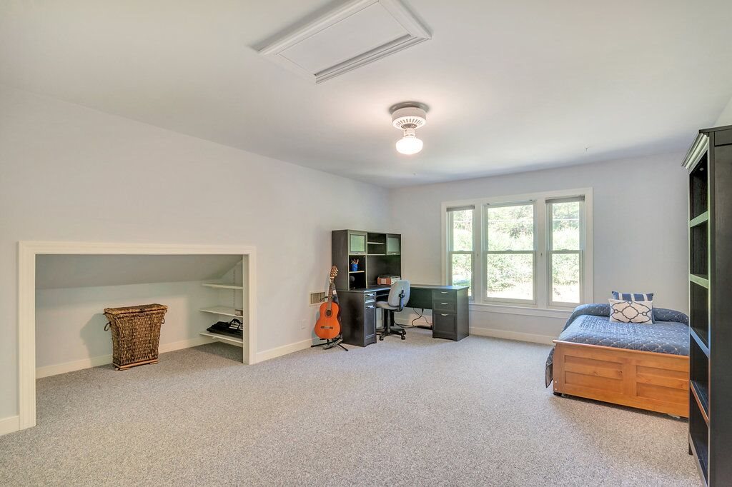6588 Plank Road Afton, VA 22920 - Photo 13 of 16 a bedroom with furniture and a large window