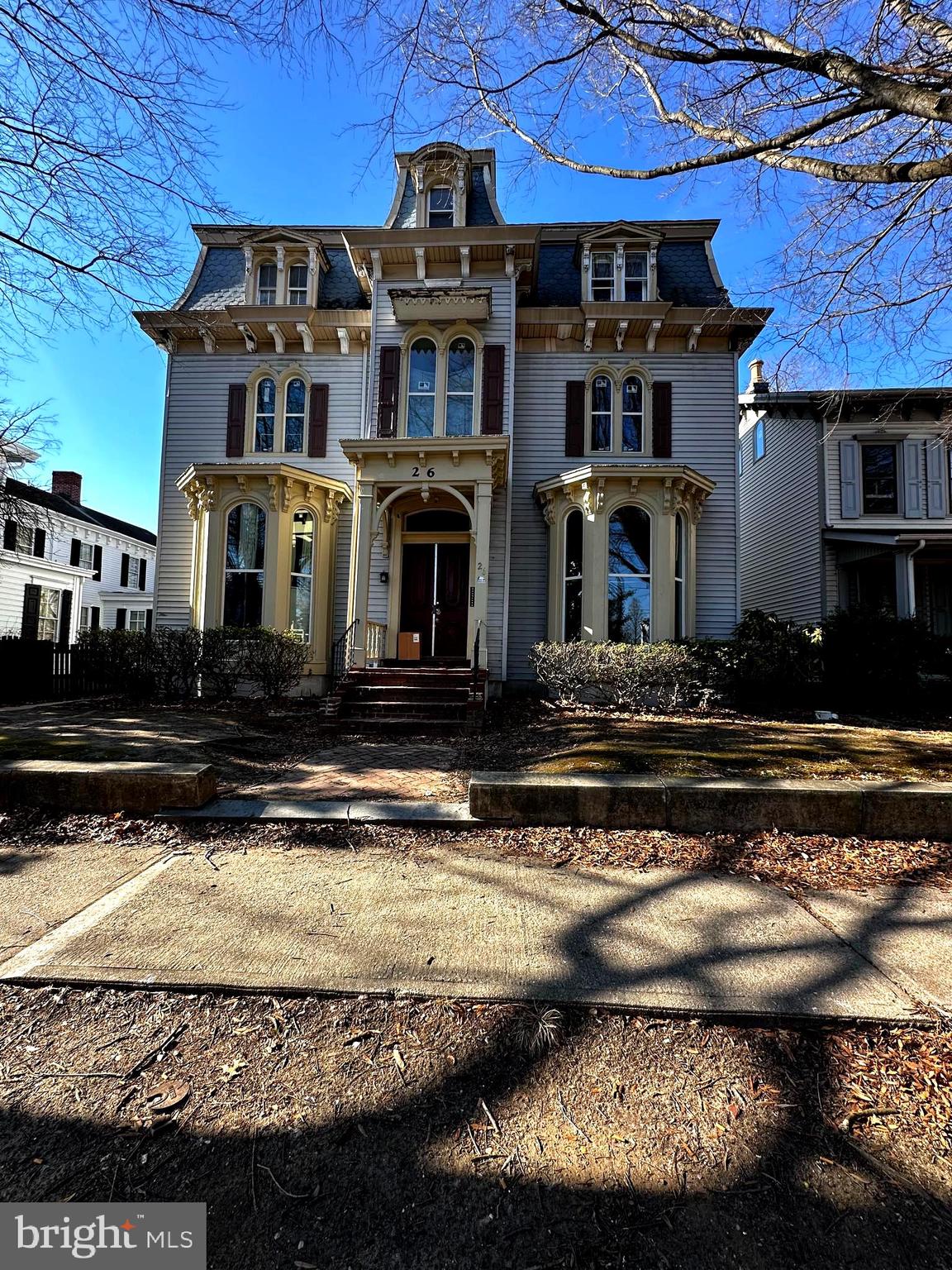 26 South State Street Dover, DE 19901 - Photo 1 of 16 a front view of a house with a yard
