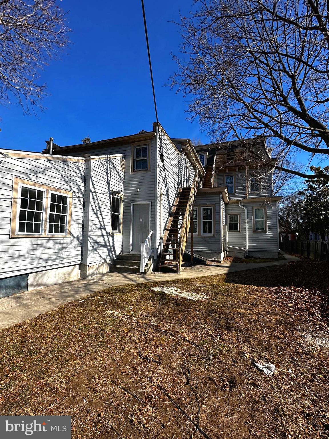 26 South State Street Dover, DE 19901 - Photo 3 of 16 a view of a house with a patio