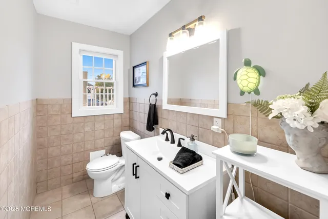 a view of a house with a yard porch and sitting area