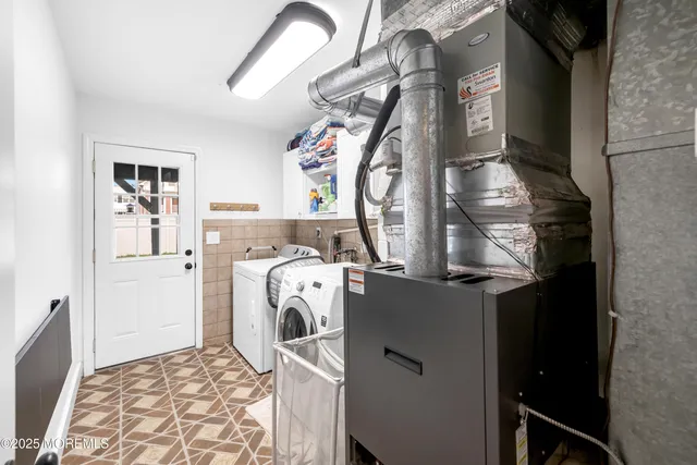 a front view of a house with a yard and porch