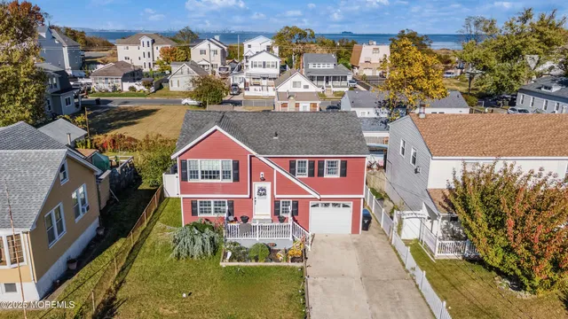 a large kitchen with a table and chairs