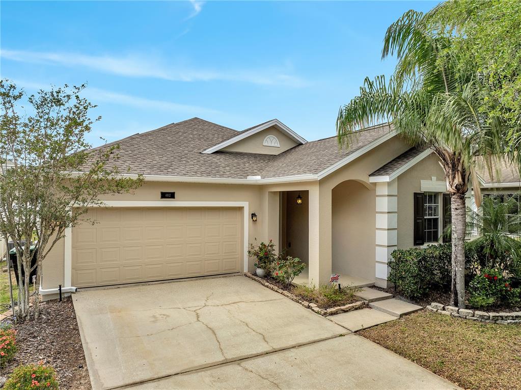 a front view of a house with a garage