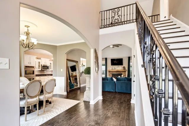 a view of living room with furniture and fireplace