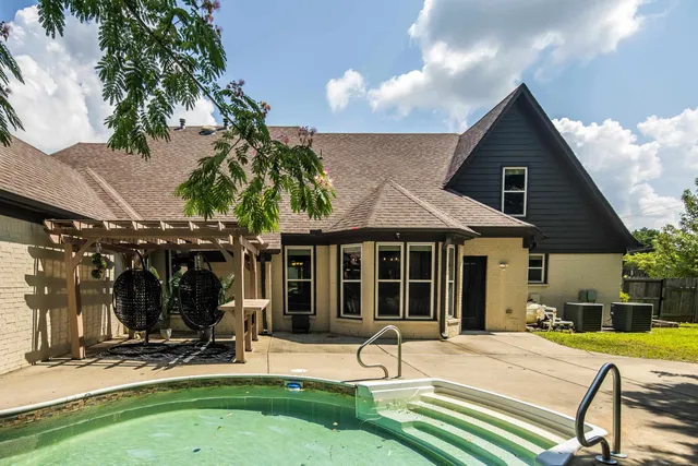 a view of a house with patio