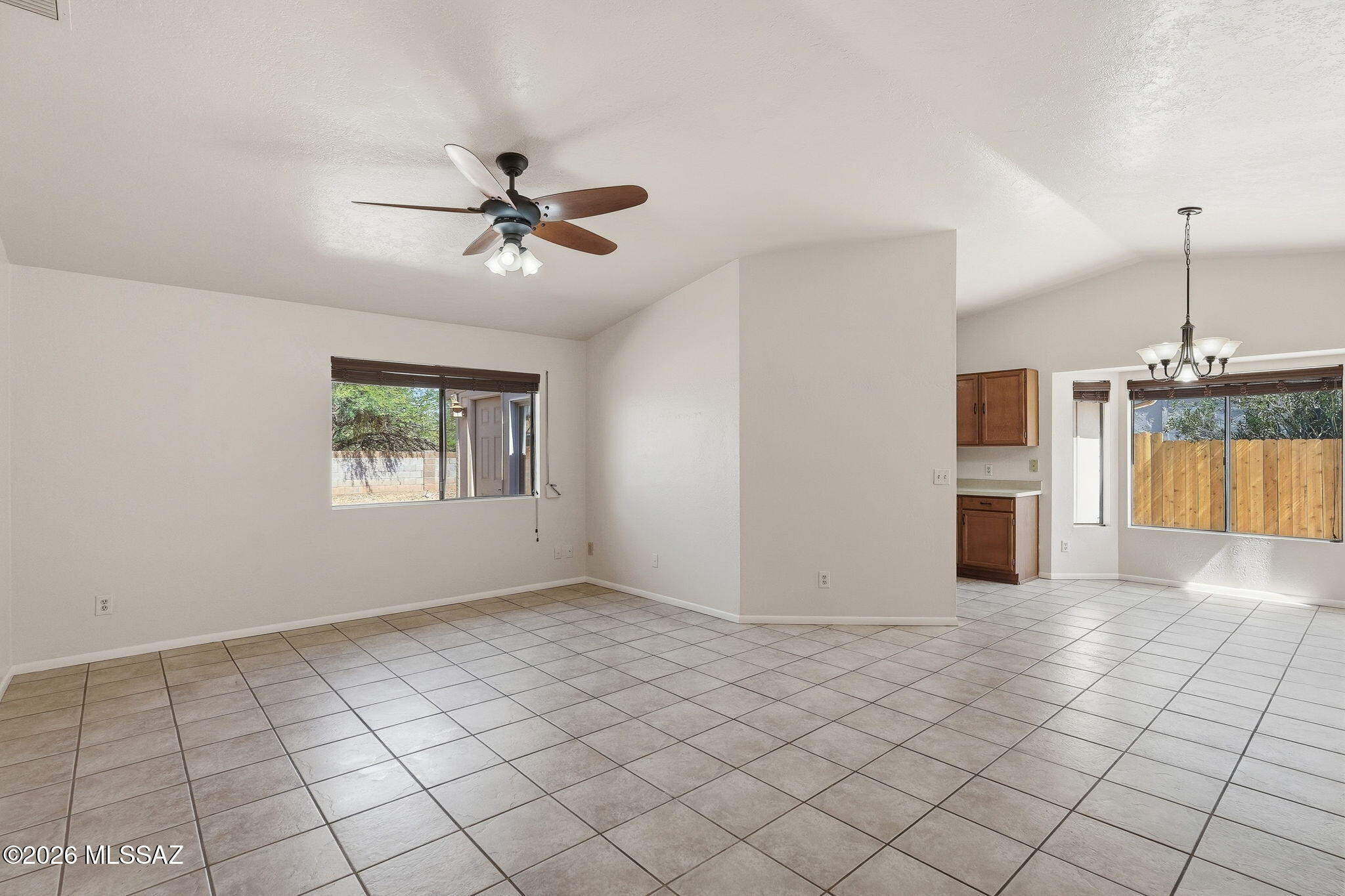 5791 North Moonbrook Road Tucson, AZ 85741 - Photo 10 of 40 Great Room with Tile Floors & Fan! Few Fresh Paint Throughout Home