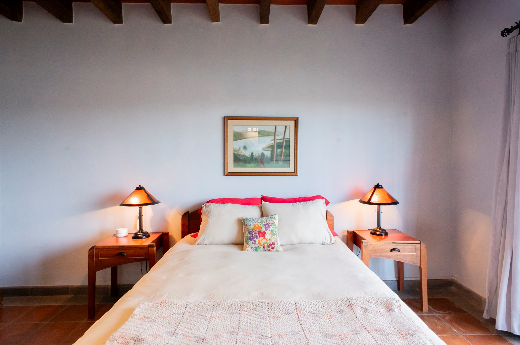 6 Camino Norte undefined, undefined 00000 - Photo 12 of 34 a bedroom with a bed and a chandelier