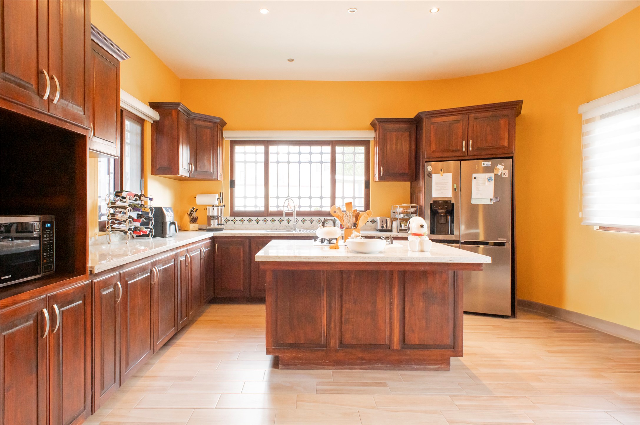6 Camino Norte undefined, undefined 00000 - Photo 20 of 34 a large kitchen with stainless steel appliances granite countertop a stove a sink dishwasher and a refrigerator with wooden floor