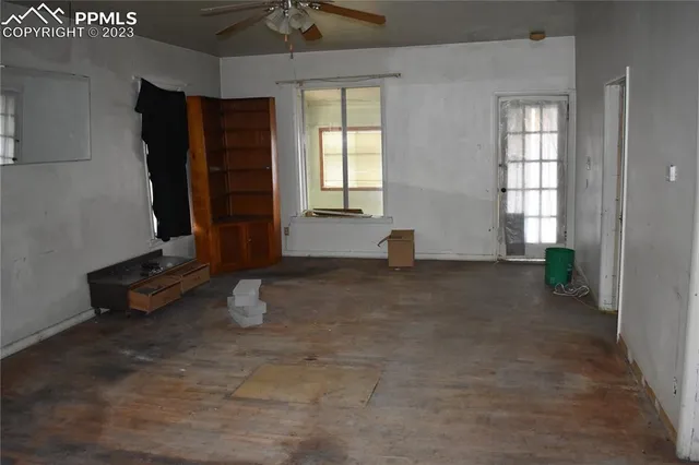 an empty room with windows