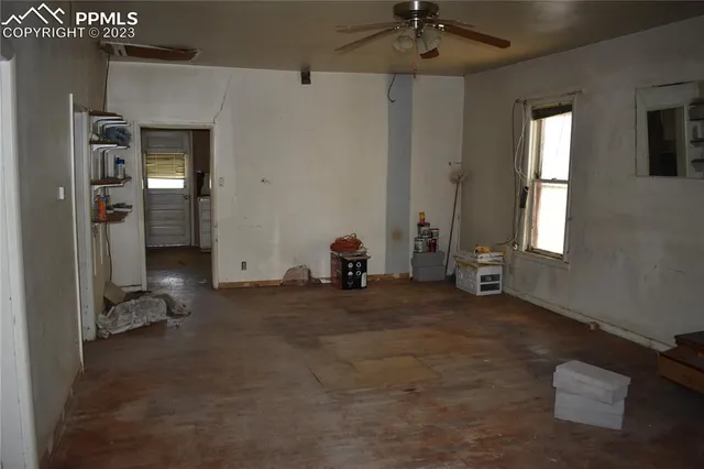 a bathroom with a glass door shower and a sink