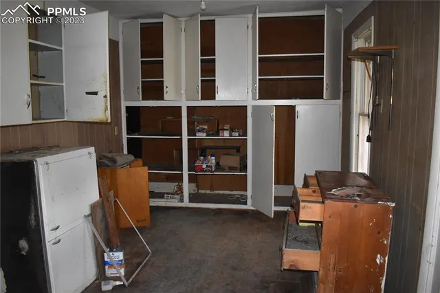 a view of room with cabinets