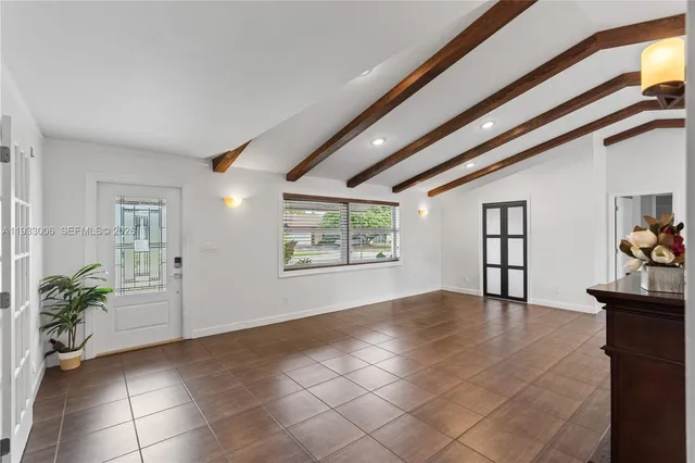 a view of kitchen and wooden floor