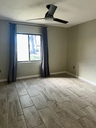 a view of an empty room and window