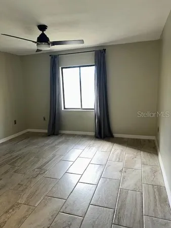 a view of an empty room and window