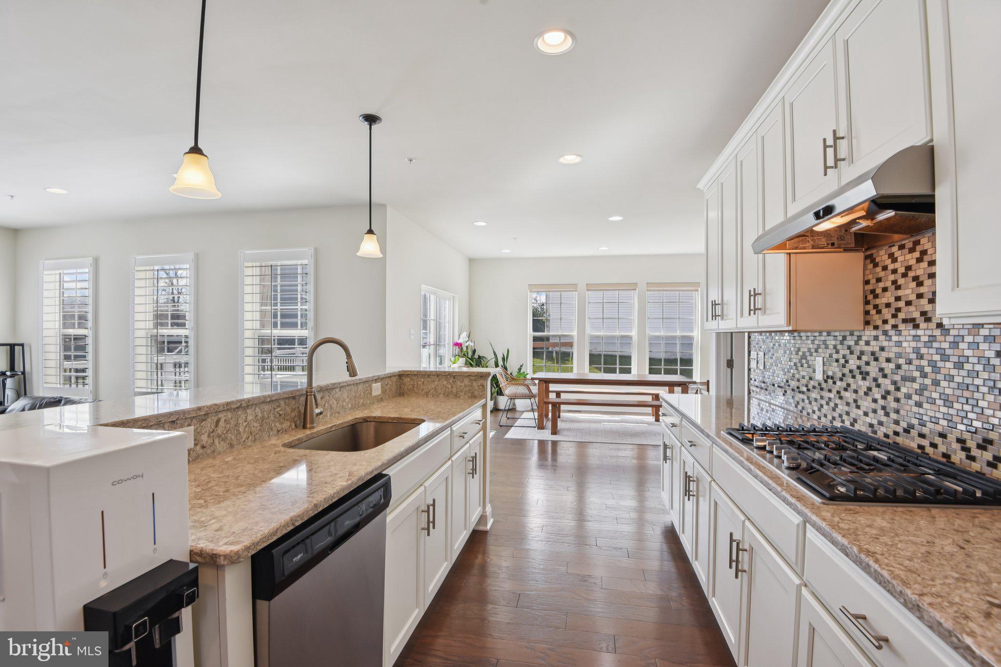 8616 Doves Fly Way Laurel, MD 20723 - Photo 15 of 90 kitchen to sunroom