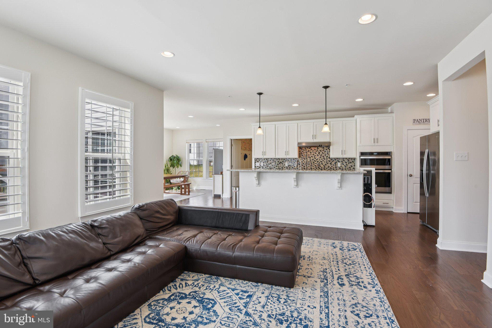 8616 Doves Fly Way Laurel, MD 20723 - Photo 22 of 90 family room to kicehn