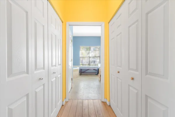 a view of a bathroom from a hallway