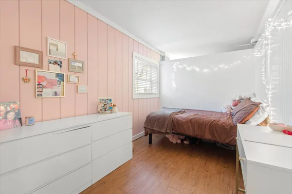 a bedroom with a bed and a cabinets