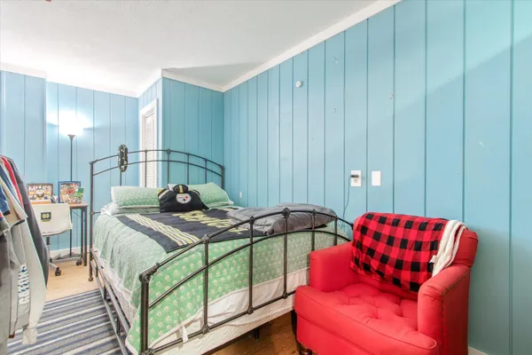 a bed room with a bed and a couch