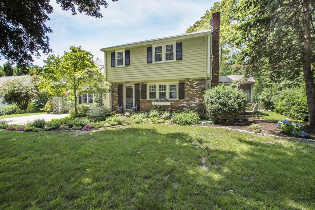 7 Jackson Road Scituate, MA 02066 - Photo 1 of 24 a front view of house with yard and green space